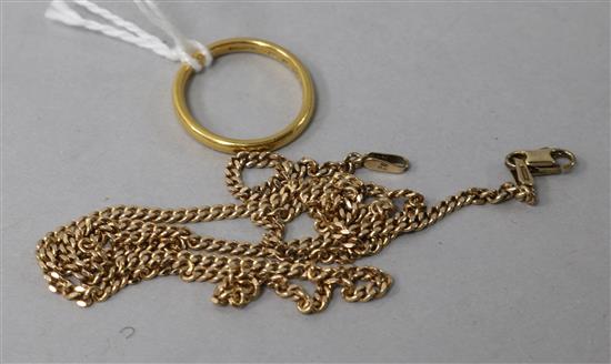 A 22ct gold wedding band and a 9ct gold fine chain.